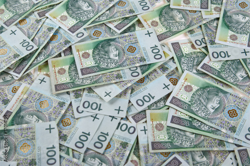 background made of polish 100 zloty banknotes