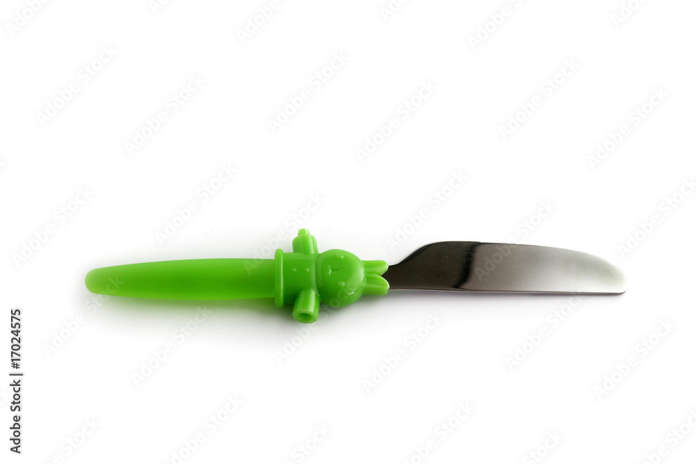Obraz premium Couteau vert pour enfant sur fond blanc