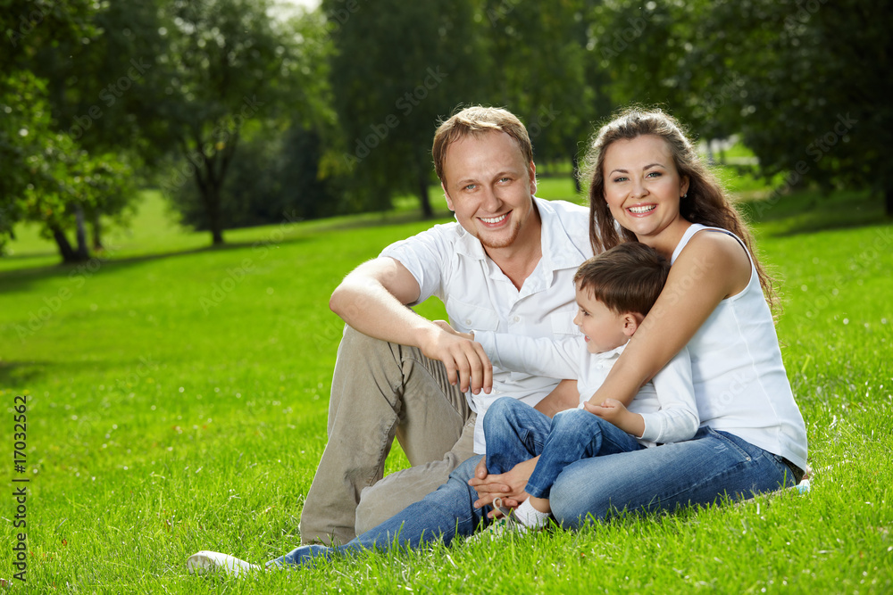 Joyful parents and small son Joyful parents and small son