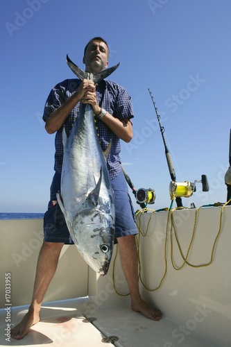 Angler fihing big game bluefin tuna on Mediterranean photo