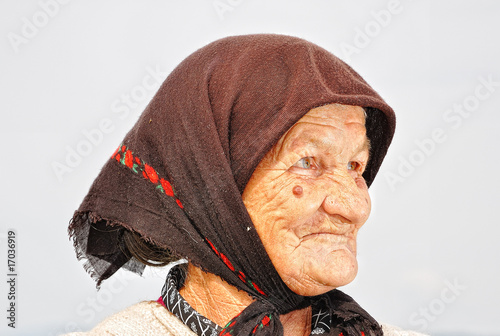 Very old woman with expression on her face photo