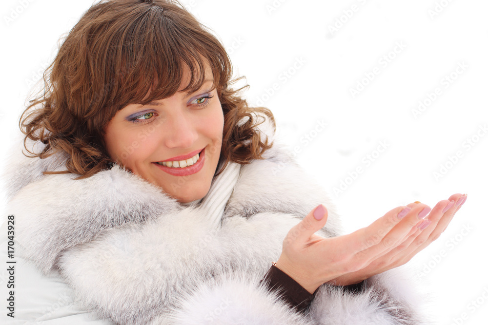 Picture of a young woman in fur coat with copyspace Picture of a young woman in fur coat with copyspace