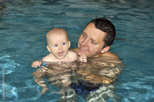 baby with dad in water