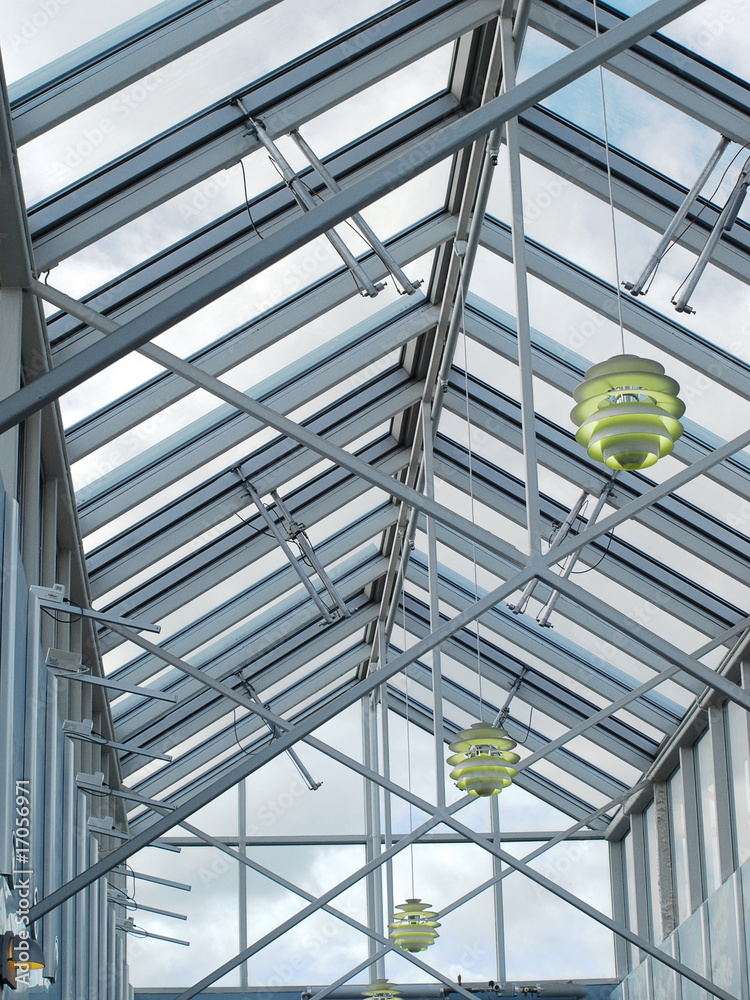Obraz premium Metal and glass translucent roof zenith skylight structure.