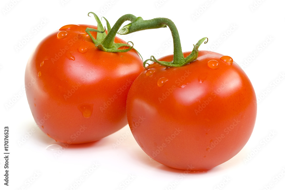 Ripe red tomatoes on a white background with clipping path Ripe red tomatoes on a white background with clipping path
