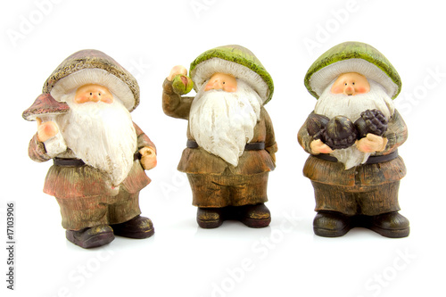 Three stone autumn dolls over white background