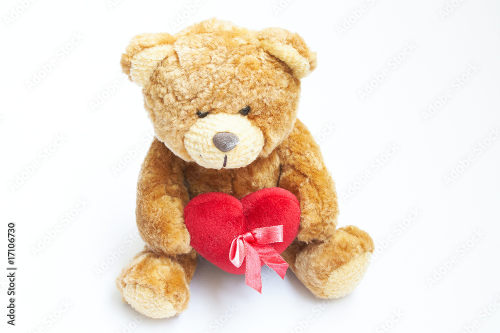 Obraz premium Brown Teddy Bear with heart