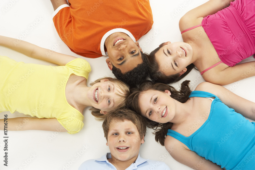 Overhead View Of Five Young Children In Studio