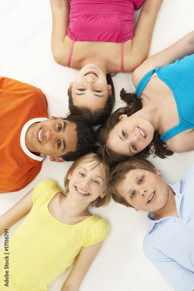 Overhead View Of Five Young Children In Studio