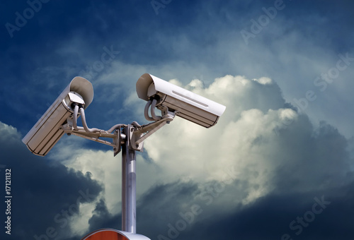 security camera under blue sky photo