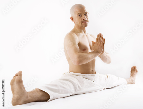 Man  sitting yoga style photo