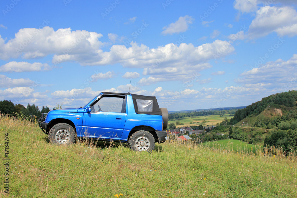 Off-road. 4x4 jeep at the top of a hill