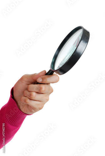 Woman holding a magnifying glass