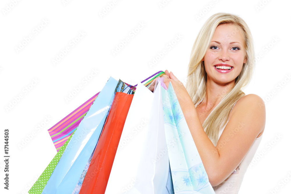 Attractive laughing blond woman present shopping bags Attractive laughing blond woman present shopping bags