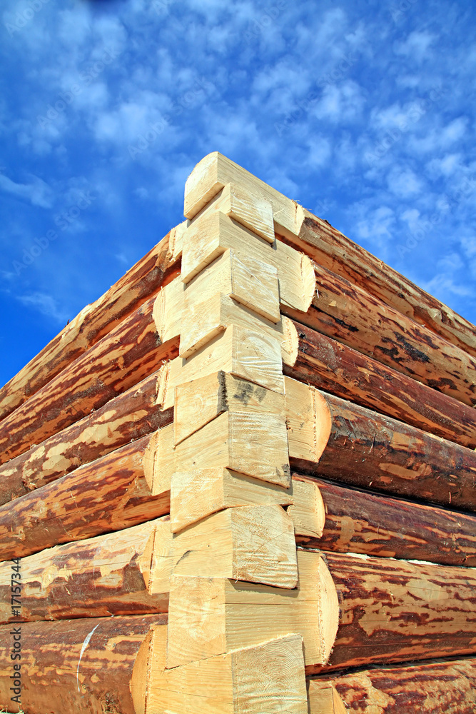 .corner of the new wooden building .corner of the new wooden building