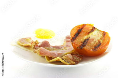 Bacon, Eggs and Tomato on a White Plate