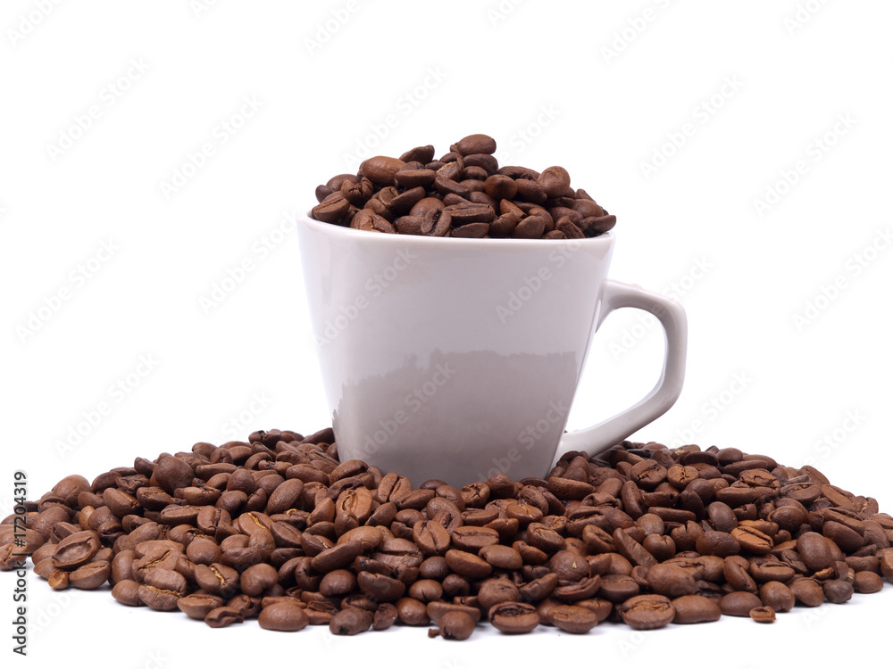 Cup with coffee beans Cup with coffee beans
