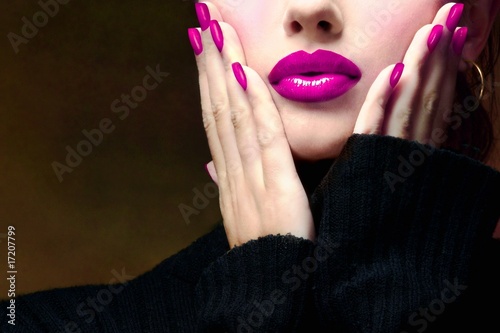 Pretty woman with a pink makeup