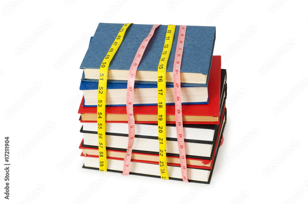 Measuring the knowledge - concept with books on white Measuring the knowledge - concept with books on white