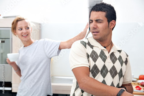 young couple having a conflict photo