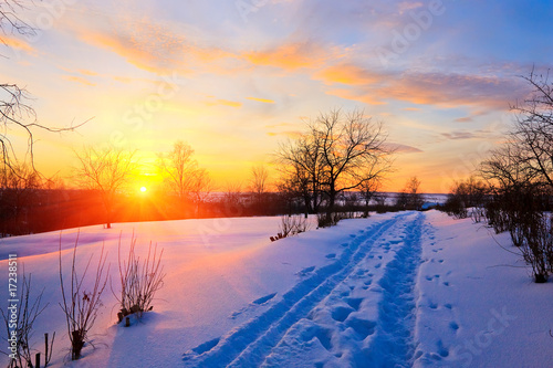 Beautiful sunset in countryside at winter, Russia