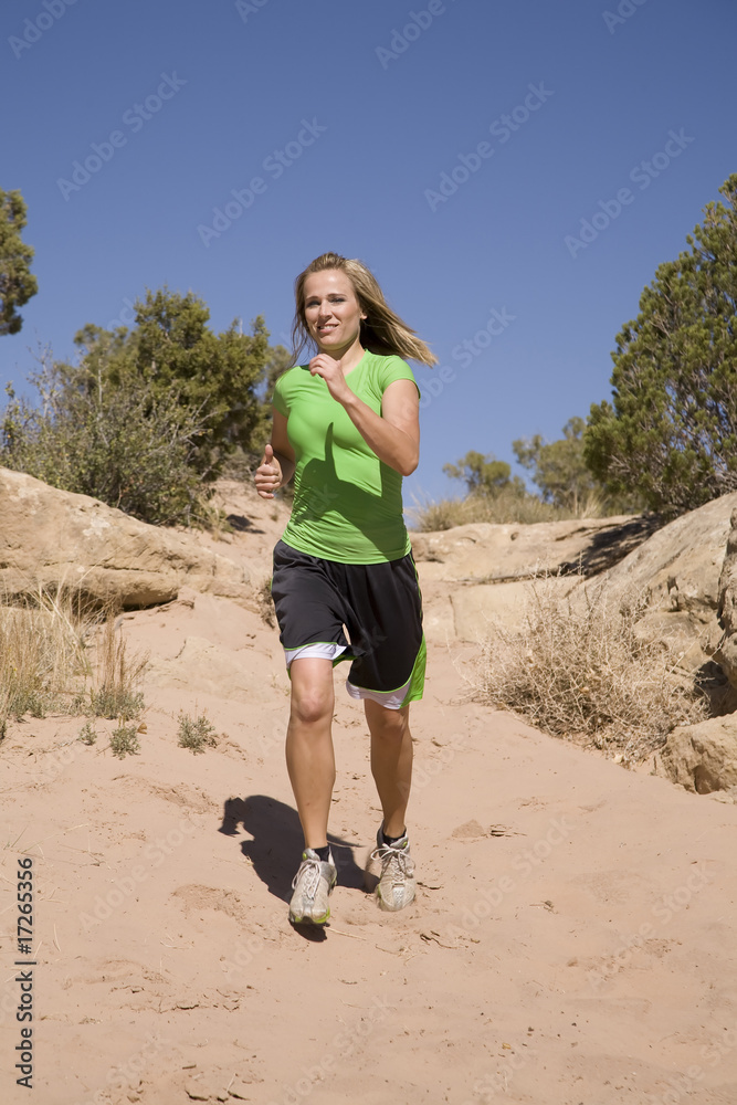 Woman jogging on trail