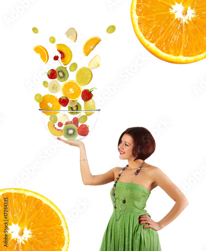 Beautiful young woman with a fruit salad