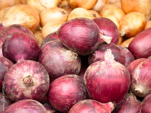 Red and Yellow Onions at an outdoor market