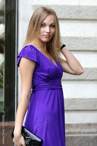 Smiling young woman on urban background