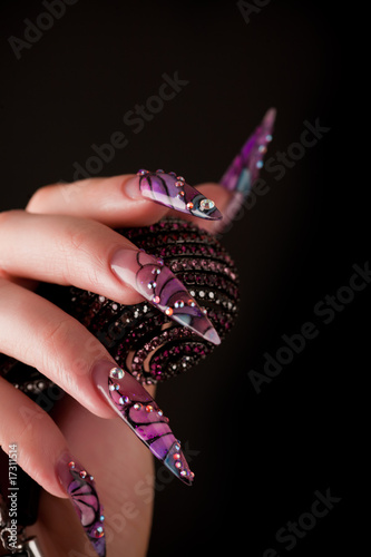Human  fingers with long fingernail
