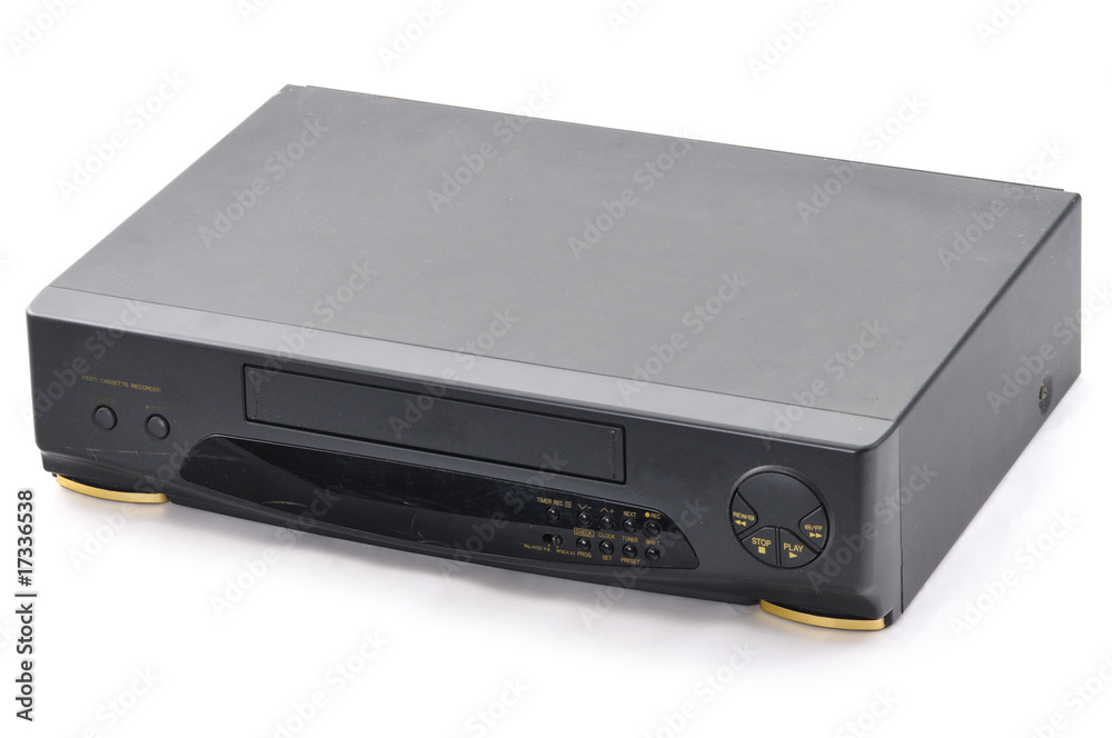 Old video cassette recorder on the white background. Old video cassette recorder on the white background.