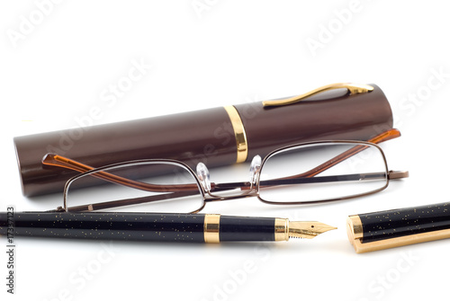 Spectacles and pen