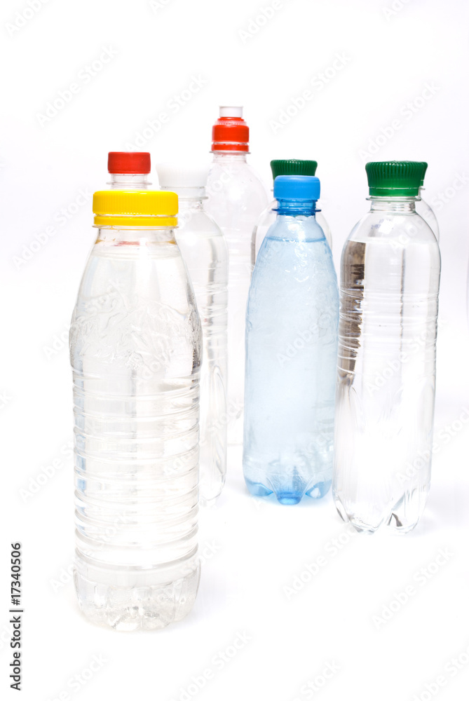 Plastic bottles of mineral water isolated on white background Plastic bottles of mineral water isolated on white background