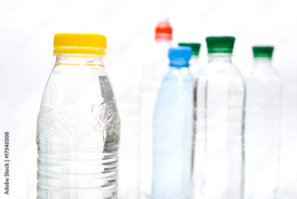 Plastic bottles of mineral water isolated on white background Plastic bottles of mineral water isolated on white background