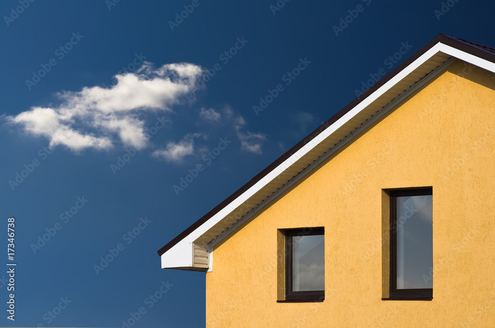 abstract beautiful house facade under blue sky