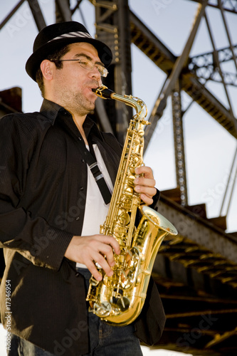 saxophonist plays outdoors