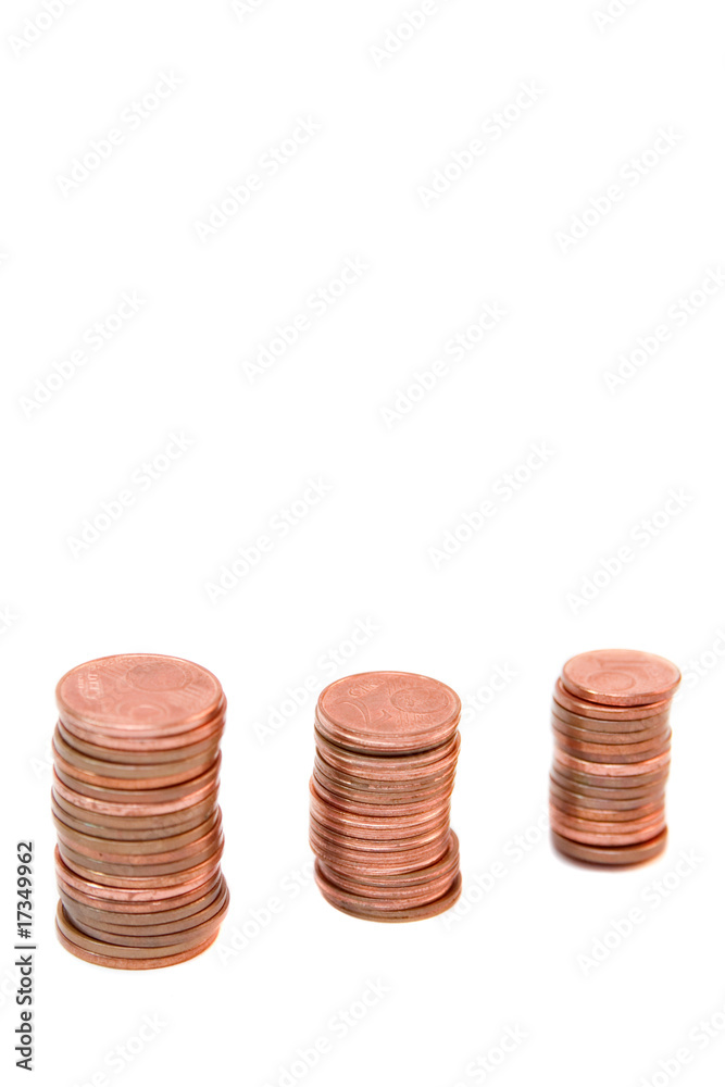 towers of golden coins isolated on white towers of golden coins isolated on white