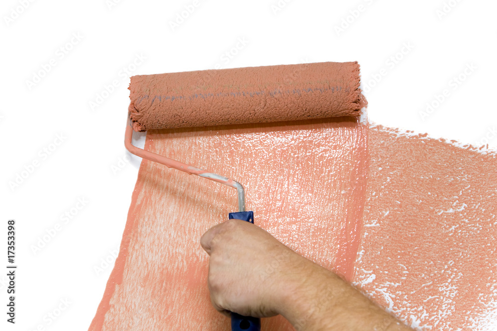 Obraz premium Paint roller on a wall