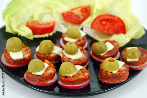 delicatessen with olives and salad