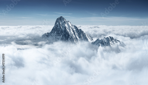 Mountain in the clouds photo