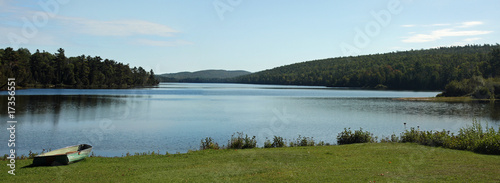 Summer camp on an alpine lake photo