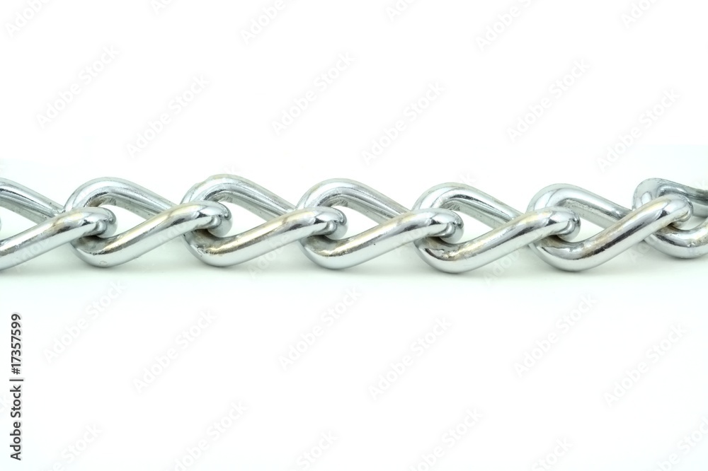 Fototapeta premium A silver chain un horizontally and isolated on white.