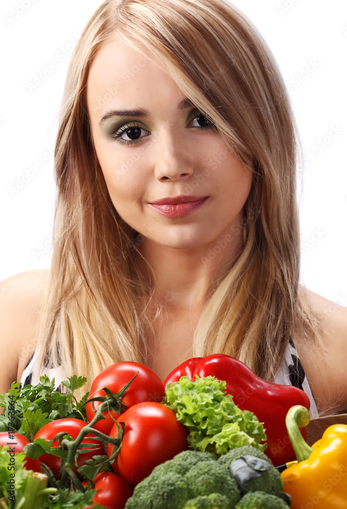 A woman holds a bags full of fresh food A woman holds a bags full of fresh food