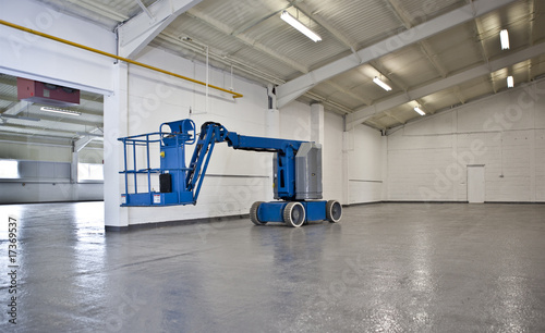 industrial elevated crane platform in empty warehouse
