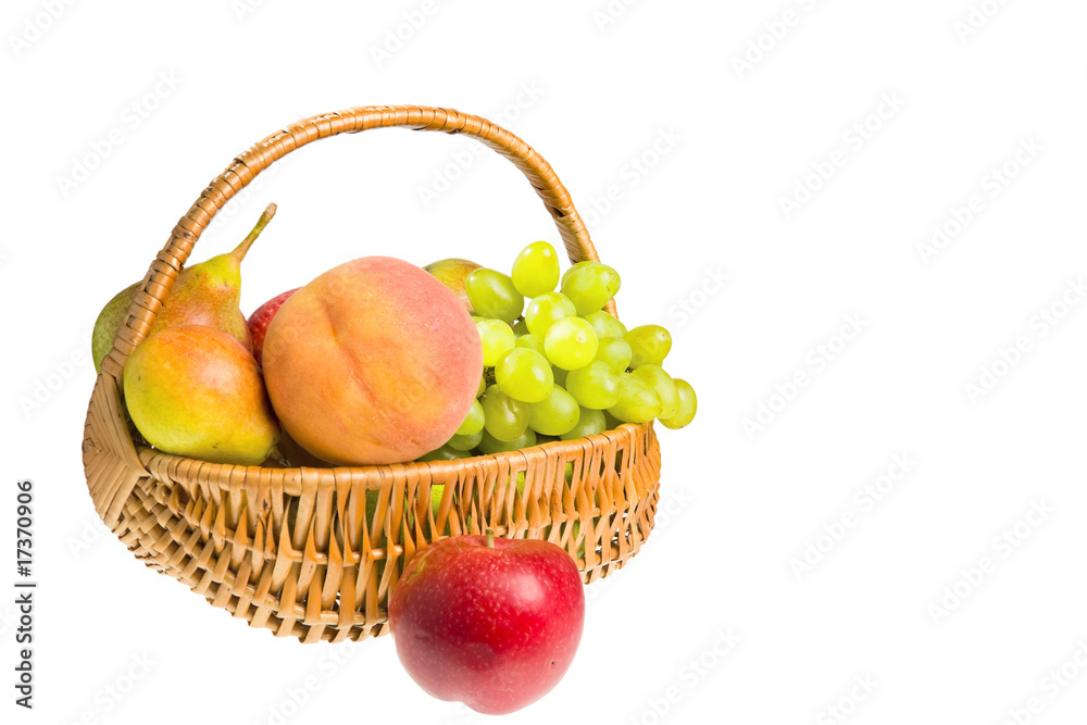 hamper with fruits isolated on the white background