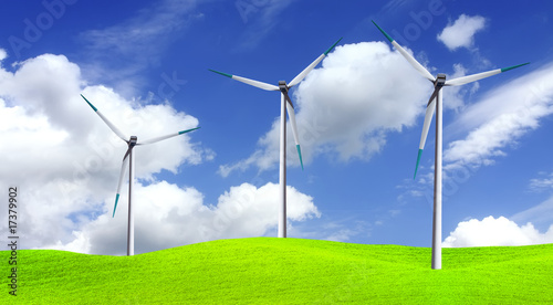 Wind farm turbines in green field