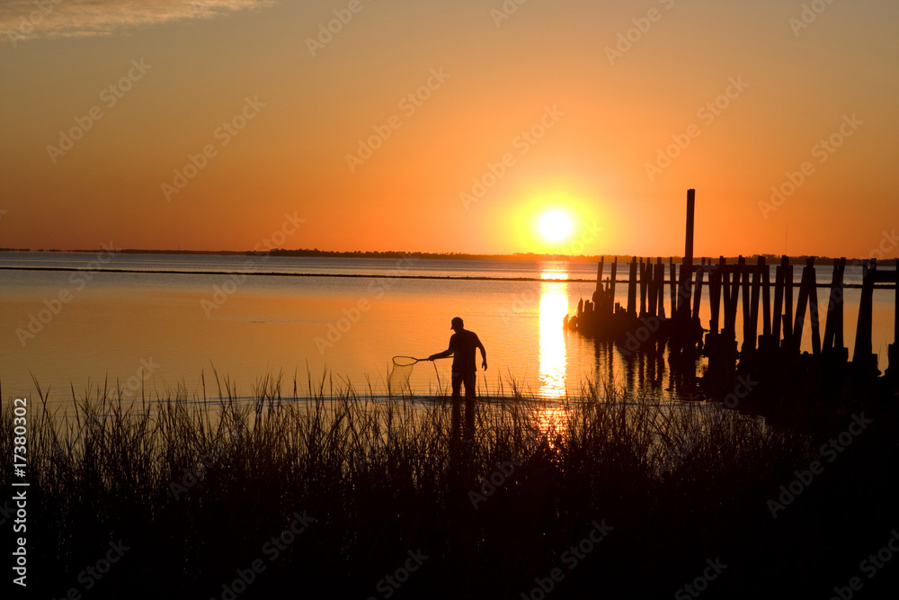 Fototapeta premium Crabbing At Sunset