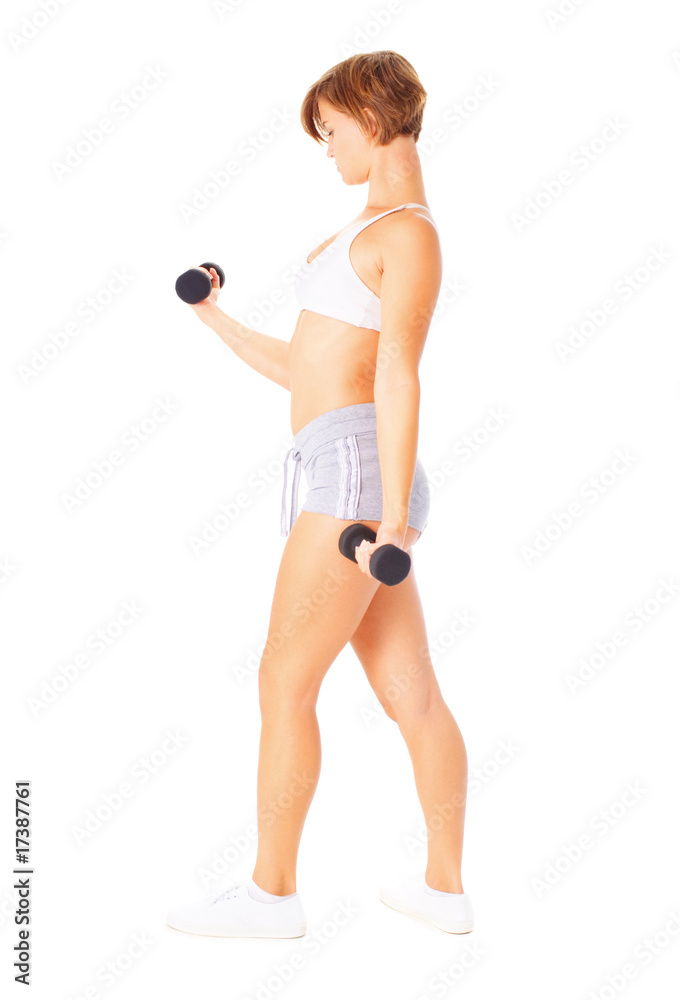 Fototapeta premium Young Woman Lifting Weights