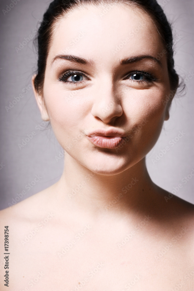 Girl blowing kiss