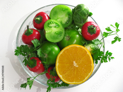 Fresh vegetables and fruits in round bowl made of glass